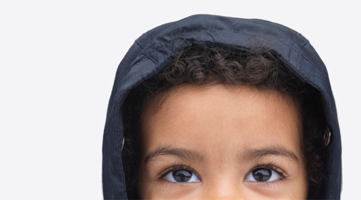 Little girl looking up